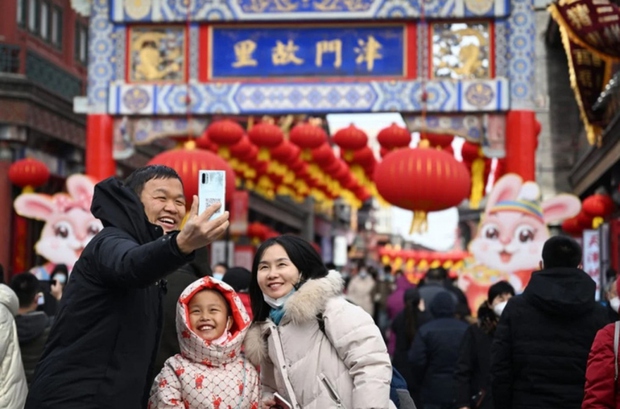 Người Trung Quốc chọn du lịch, ẩm thực và điện ảnh trong dịp Tết - Ảnh 1.