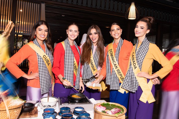 Dàn thí sinh Miss Grand International tại Huế: Lần đầu mặc áo bà ba đổ bánh xèo, Lê Hoàng Phương dừng bước phần thi này - Ảnh 2.