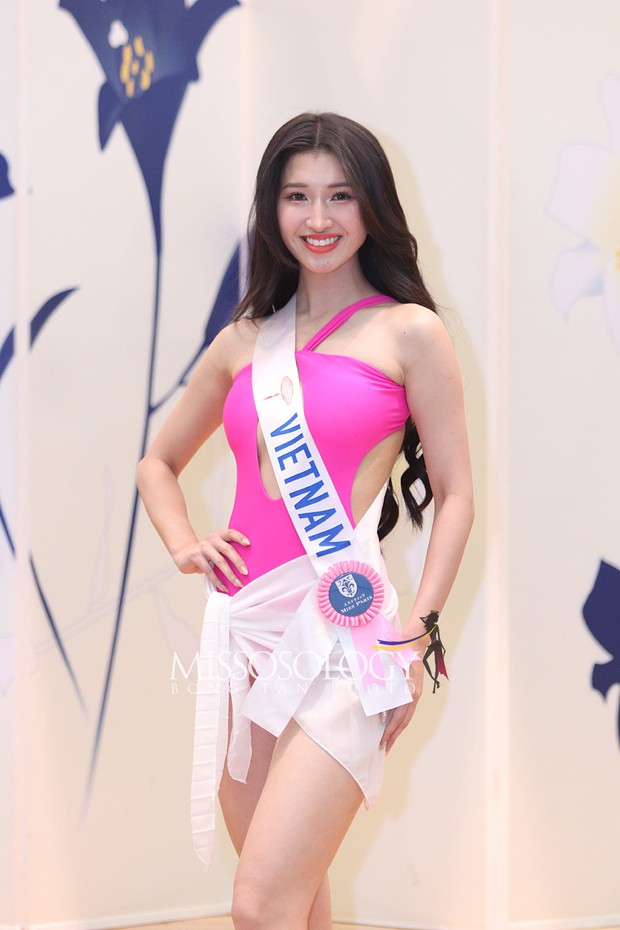 Phương Nhi tiết chế mặc hở ở Hoa hậu Quốc tế - Ảnh 3.