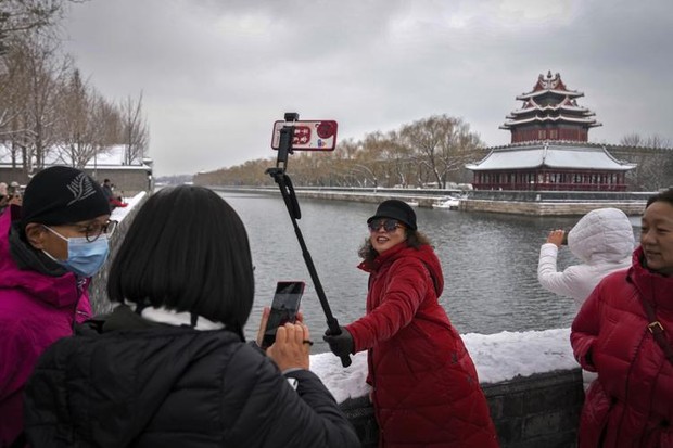 Trung Quốc: Tuyết đầu mùa bao phủ tạo nên cảnh tượng đẹp đến nao lòng tại Tử Cấm Thành - Ảnh 11.