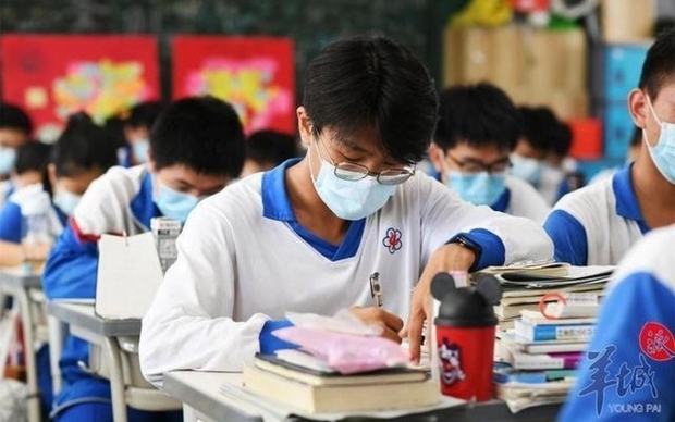 Trung Quốc bùng phát dịch cúm A, học sinh nhiều trường phải nghỉ học - Ảnh 1.
