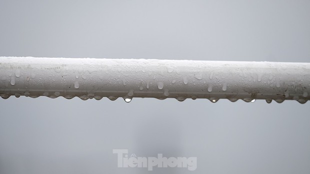 Hà Nội bắt đầu chuỗi ngày mưa phùn, nồm ẩm - Ảnh 9.