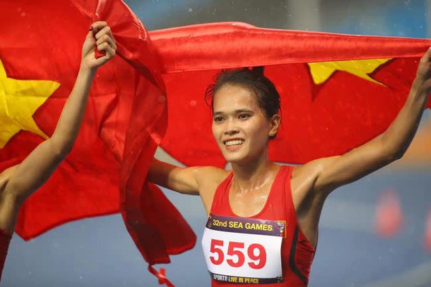 Nữ hoàng điền kinh Việt Nam bứt tốc đẳng cấp trong cơn mưa lớn, đem về Huy chương vàng SEA Games 32 - Ảnh 7.