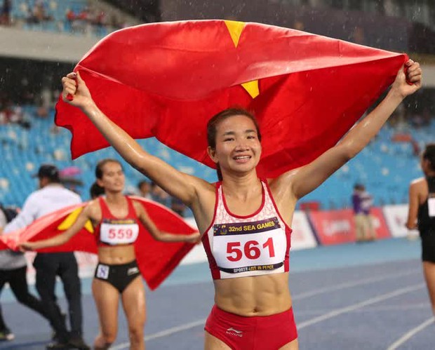 Nữ hoàng điền kinh Việt Nam bứt tốc đẳng cấp trong cơn mưa lớn, đem về Huy chương vàng SEA Games 32 - Ảnh 5.