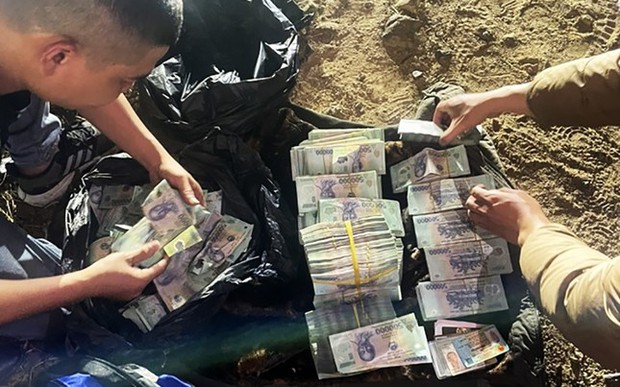 Kẻ cướp ngân hàng chiều 28 Tết định trốn sang Campuchia cùng ba lô tiền - Ảnh 4.