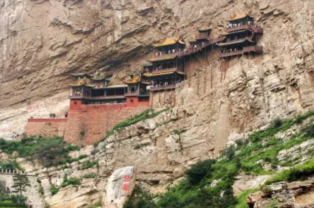 Ngôi chùa nguy hiểm nhất Trung Quốc cheo leo trên vách núi hơn 1.500 năm - Ảnh 3.