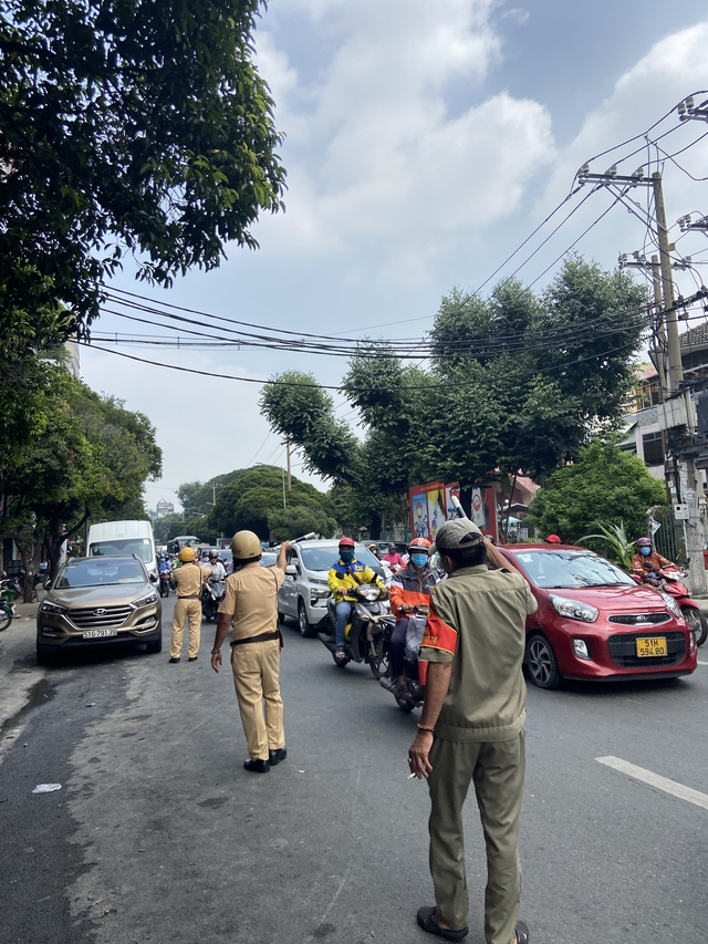 Vụ cháy nhà nhiều tầng ở quận Tân Bình: 2 người tử vong, hơn 10 người phải nhập viện - Ảnh 8.