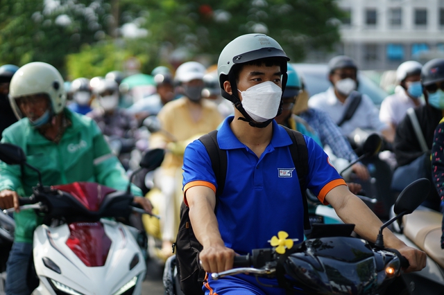 Cảnh tượng trên đường phố Hà Nội và TP.HCM trong ngày đầu đi làm sau kỳ nghỉ lễ - Ảnh 22.