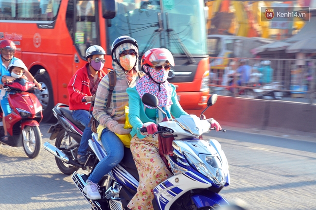 Người dân trở lại Hà Nội, Sài Gòn sau kỳ nghỉ lễ kéo dài 3 ngày - Ảnh 13.