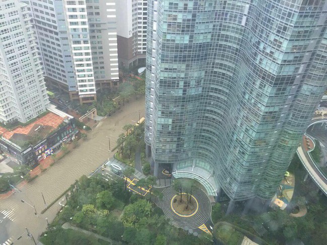 Cảnh tượng ngập lụt, đổ nát kinh hoàng sau bão tại siêu đô thị Busan của Hàn Quốc - Ảnh 5.