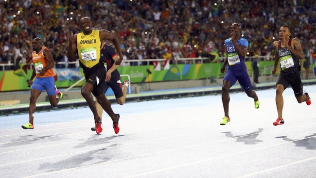 Giành huy chương vàng nội dung 200 m, Usain Bolt đi vào lịch sử Olympic - Ảnh 3.