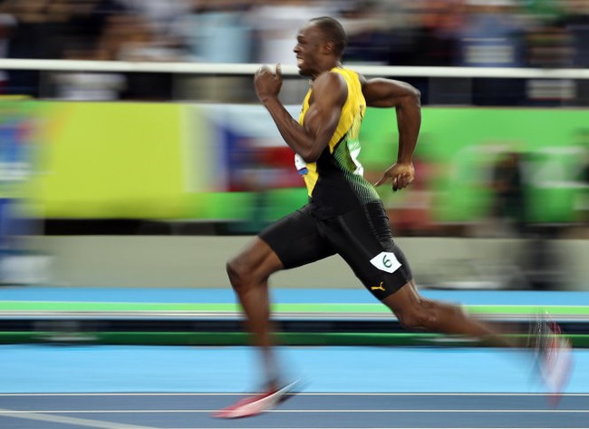 Giành huy chương vàng nội dung 200 m, Usain Bolt đi vào lịch sử Olympic - Ảnh 4.