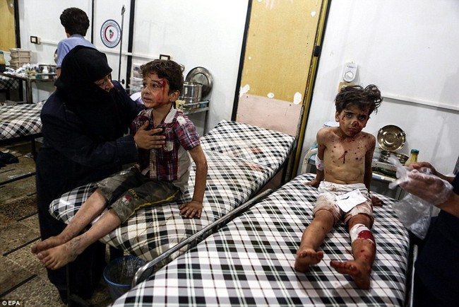 Loạt hình ám ảnh về những đứa trẻ phải sống trong bom đạn chiến tranh ở Syria - Ảnh 6.