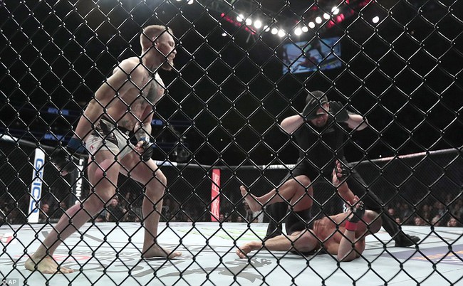 Hạ knock-out đối thủ, Conor McGregor đi vào lịch sử võ đài UFC - Ảnh 7.