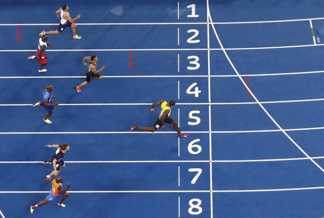Giành huy chương vàng nội dung 200 m, Usain Bolt đi vào lịch sử Olympic - Ảnh 5.