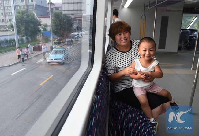 Trung Quốc: ra mắt xe bus đè đầu cưỡi cổ tất cả xe hơi để chống tắc đường - Ảnh 7.