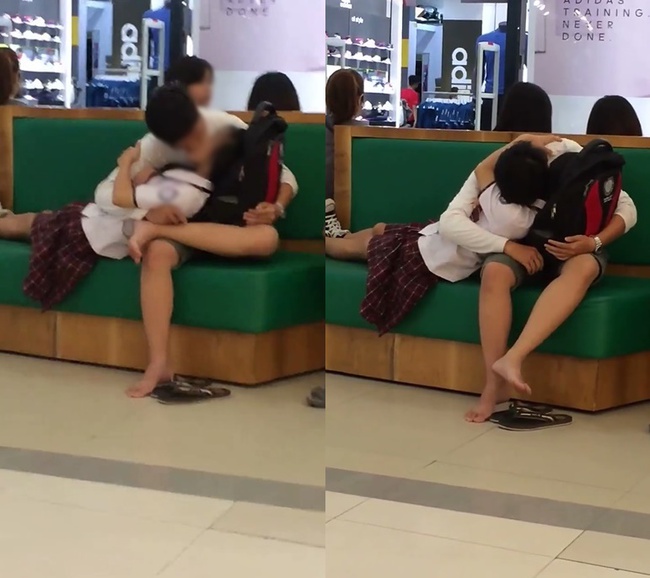 Nữ sinh mặc đồng phục hồn nhiên nằm trên lòng và ôm hôn bạn trai giữa trung tâm thương mại - Ảnh 3.