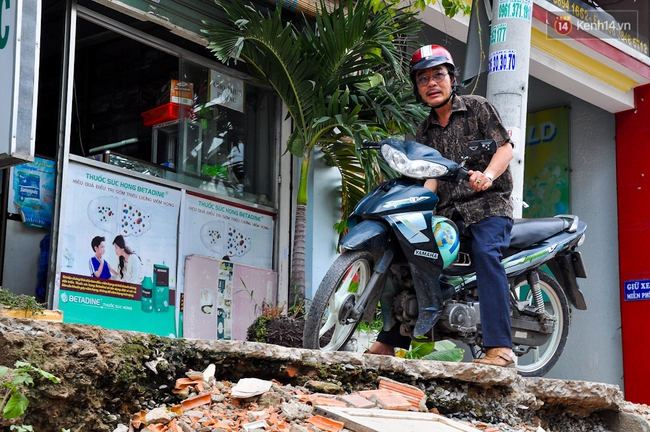 Nâng cấp đường vào sân bay Tân Sơn Nhất, người dân phải... leo dốc vào nhà - Ảnh 9.