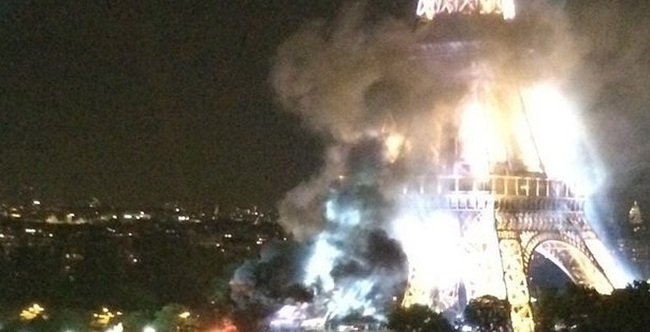 Th&aacute;p Eiffel bốc kh&oacute;i ngay sau vụ thảm s&aacute;t đ&aacute;m đ&ocirc;ng ở Nice - Ảnh 1.