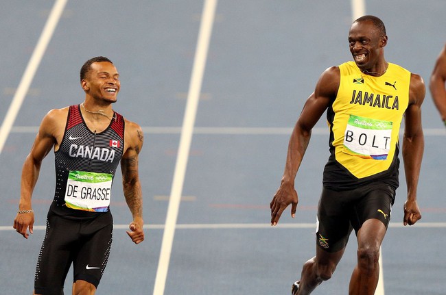 Usain Bolt vừa chạy vừa buôn dưa lê với đối thủ - Ảnh 2.