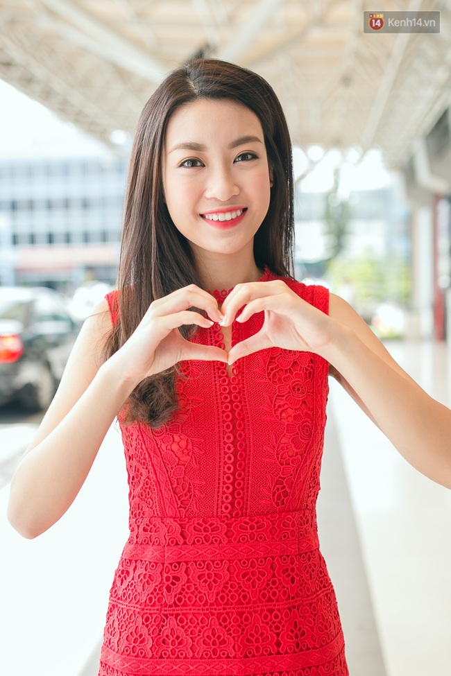 Hoa hậu Đỗ Mỹ Linh xinh đẹp rạng ngời tại sân bay về Hà Nội sáng nay! - Ảnh 21.