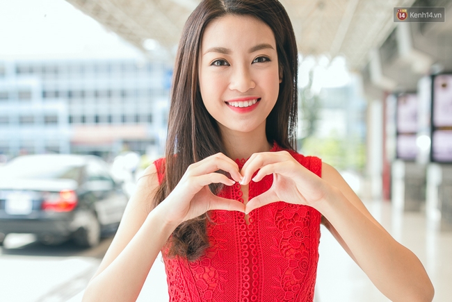 Hoa hậu Đỗ Mỹ Linh xinh đẹp rạng ngời tại sân bay về Hà Nội sáng nay! - Ảnh 22.