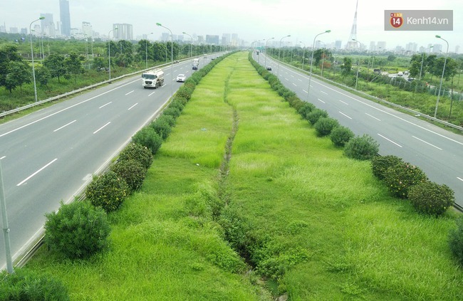 53 tỷ đồng tiền cắt cỏ 24km trên đại lộ Thăng Long được chi như thế nào? - Ảnh 1.