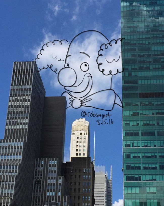 Họa sĩ vẽ tranh hoạt hình lên những đám mây - Ảnh 2.