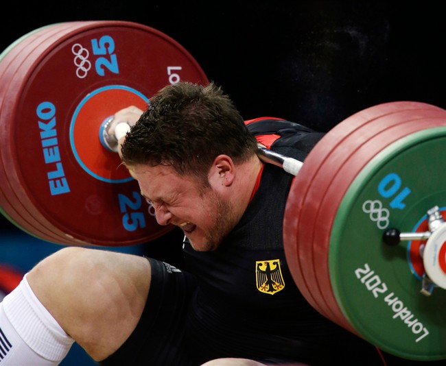Bạn c&ograve;n nhớ c&acirc;u chuyện rớt nước mắt về ch&agrave;ng lực sĩ nặng 150 kg gi&agrave;nh HCV Olympic 2008? - Ảnh 4.