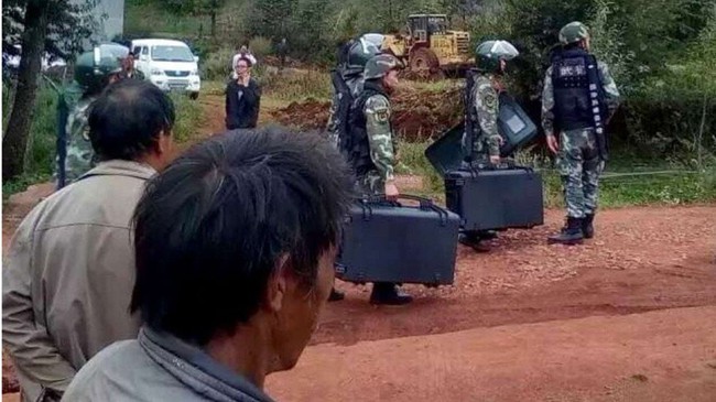 Trung Quốc bắt nghi can sát hại 19 người cùng làng - Ảnh 1.