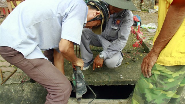 Cần khởi tố vụ &aacute;n b&eacute; 8 tuổi lọt cống chết ở B&igrave;nh Dương - Ảnh 1.