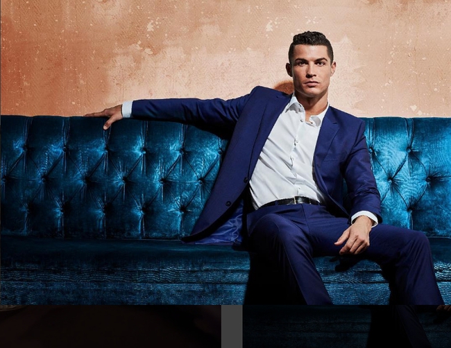 Ronaldo dính cáo buộc trốn thuế giống Messi - Ảnh 1.