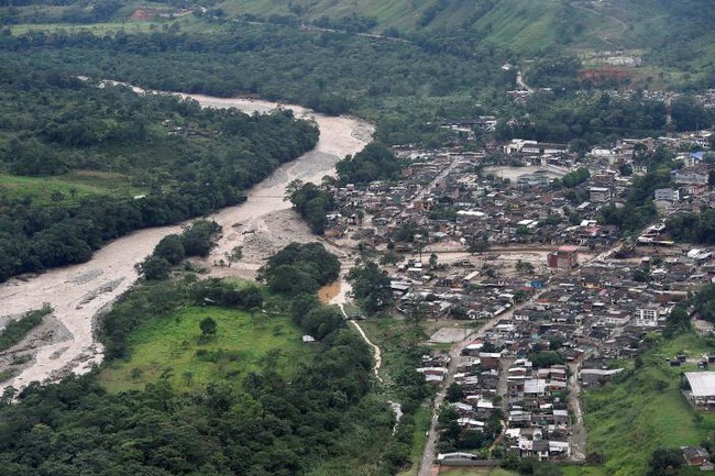 Chùm ảnh: Hiện trường vụ lở đất kinh hoàng khiến 254 người thiệt mạng ở Colombia - Ảnh 8.