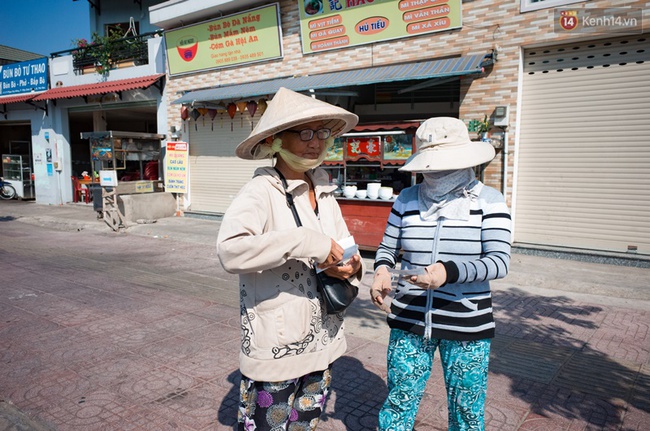 Chùm ảnh: Người dân lao động ở Sài Gòn vật lộn dưới nắng nóng oi bức để mưu sinh - Ảnh 7.