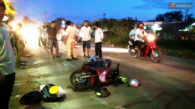 Người thân gào khóc khi cô gái bị xe khách cán tử vong trên đường phố Sài Gòn - Ảnh 1.