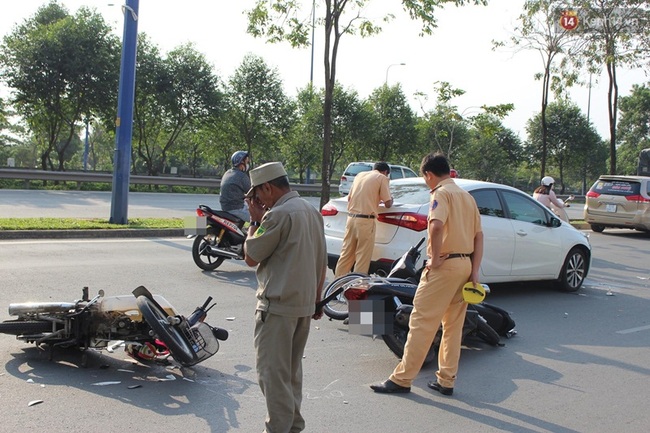 Lạc tay lái, nữ tài xế gây tai nạn liên hoàn ở Sài Gòn - Ảnh 3.