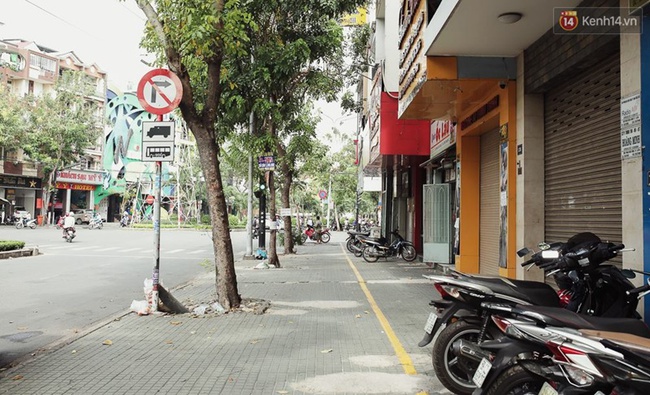Đường phố rộng thênh thang cho người đi bộ ở Sài Gòn sau chiến dịch giành lại vỉa hè - Ảnh 14.