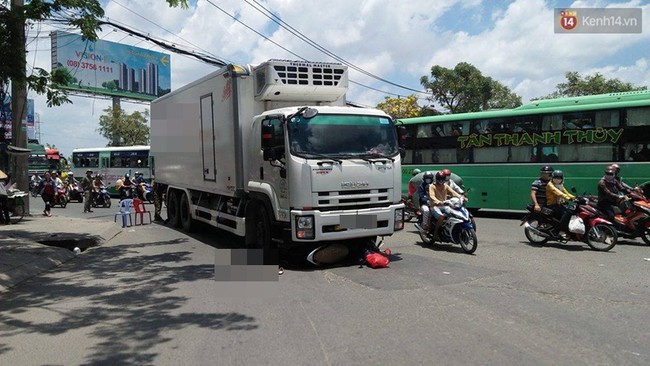 Người phụ nữ mang thai tử vong sau khi bị cuốn v&agrave;o gầm xe tải tr&ecirc;n đường phố S&agrave;i G&ograve;n - Ảnh 2.