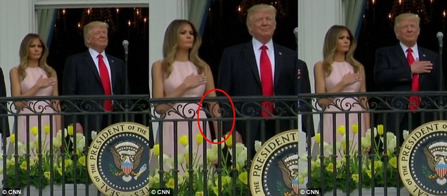 Video: Đệ nhất phu nh&acirc;n Mỹ Melania nhắc chồng đặt tay l&ecirc;n ngực khi ch&agrave;o cờ - Ảnh 2.