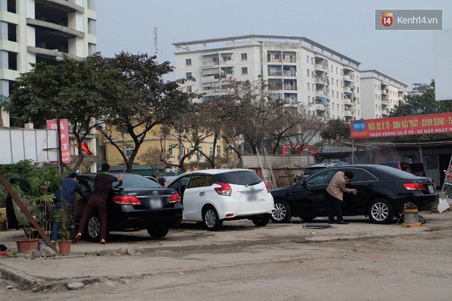H&agrave; Nội: 200 ngh&igrave;n đồng một lần rửa xe &ocirc; t&ocirc; ng&agrave;y 30 Tết, kh&aacute;ch vẫn phải chờ h&agrave;ng tiếng đồng hồ - Ảnh 2.