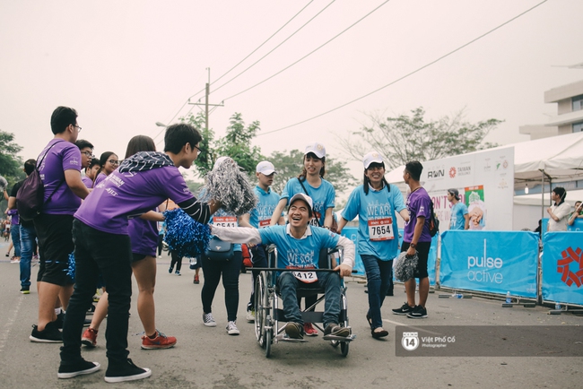 Bộ ảnh xúc động về nghị lực của những người khuyết tật trên đường chạy 5km ở Sài Gòn - Ảnh 14.