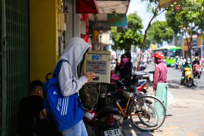 Sau 2 ngày mưa ngập đường, người Sài Gòn lại quay cuồng với nắng nóng kinh hoàng - Ảnh 14.