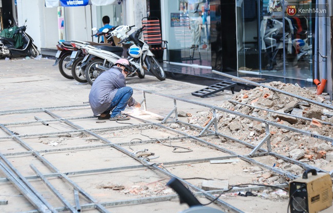 Chùm ảnh: Người dân lao động ở Sài Gòn vật lộn dưới nắng nóng oi bức để mưu sinh - Ảnh 9.