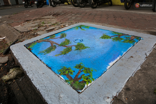 Nhìn những bức tranh trên nắp cống ở Sài Gòn đẹp như thế này, không ai nỡ xả rác nữa! - Ảnh 13.