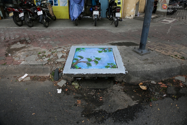 Nhìn những bức tranh trên nắp cống ở Sài Gòn đẹp như thế này, không ai nỡ xả rác nữa! - Ảnh 15.