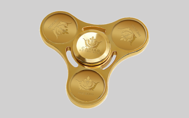 Nhiều tiền quá chẳng biết làm gì thì mua con quay fidget spinner bằng vàng để chơi - Ảnh 2.