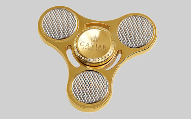 Nhiều tiền quá chẳng biết làm gì thì mua con quay fidget spinner bằng vàng để chơi - Ảnh 3.