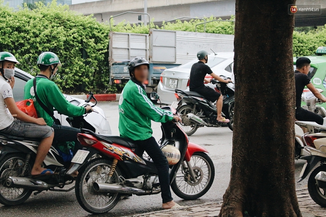 B&aacute;t nh&aacute;o cảnh h&agrave;ng chục t&agrave;i xế xe &ocirc;m mặc &aacute;o giả GrabBike bắt kh&aacute;ch ngay bến xe Mỹ Đ&igrave;nh - Ảnh 5.