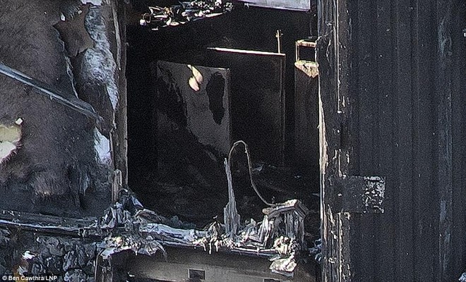 Những hình ảnh đầu tiên cho thấy khung cảnh hoang tàn bên trong tòa tháp 24 tầng sau vụ hỏa hoạn nghiêm trọng - Ảnh 5.