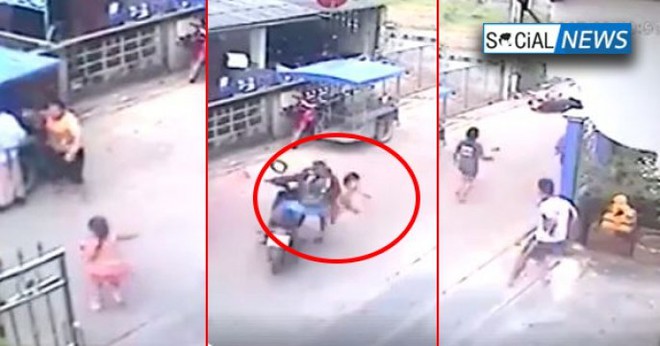 B&eacute; g&aacute;i đang chạy qua đường th&igrave; bất ngờ bị chiếc xe m&aacute;y lao như t&ecirc;n bắn t&ocirc;ng tr&uacute;ng - Ảnh 3.